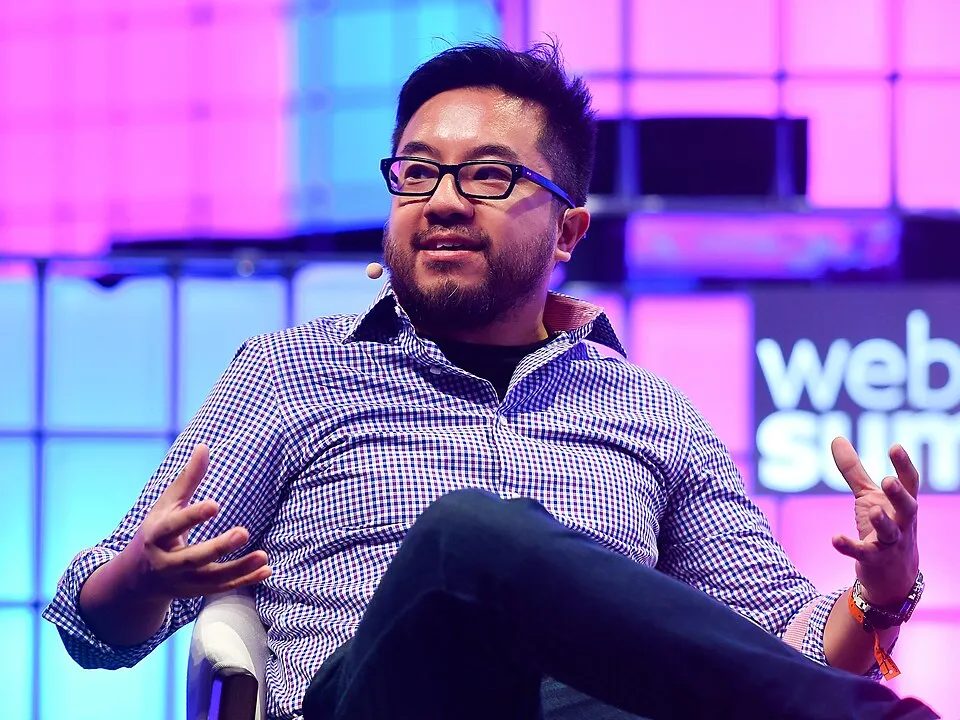 Garry Tan speaking on stage at Web Summit in 2018