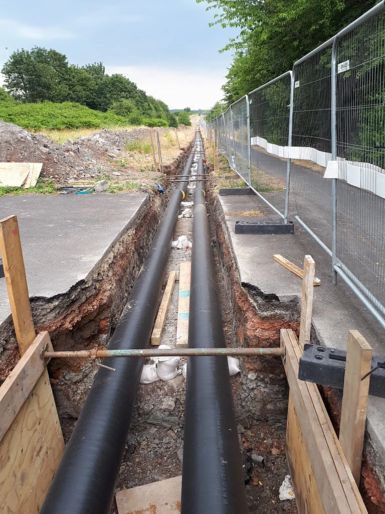 New district heating pipes laid in a trench